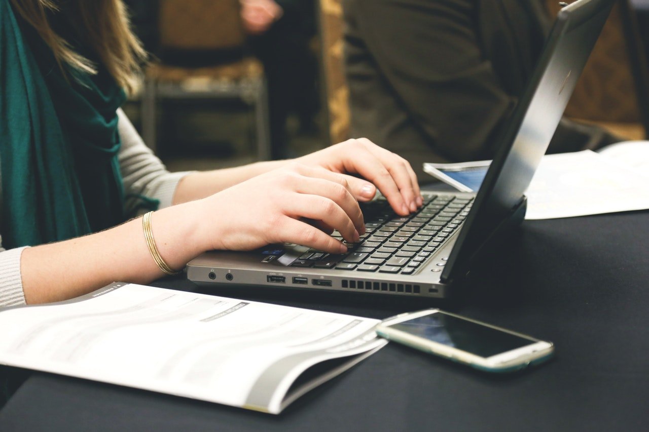 woman-typing-writing-windows-1 woman-typing-writing-windows-1